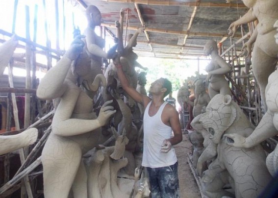 Kamalpur : Durga Puja Idol makers not hoping for a big smile Kamalpur : Durga Puja Idol makers not hoping for a big smile